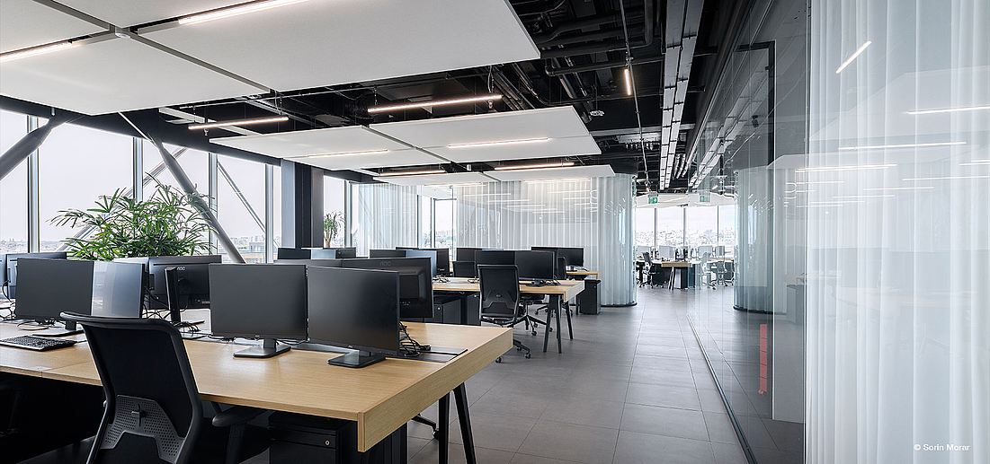 Office lighting with slim black luminaires by Luxsystem