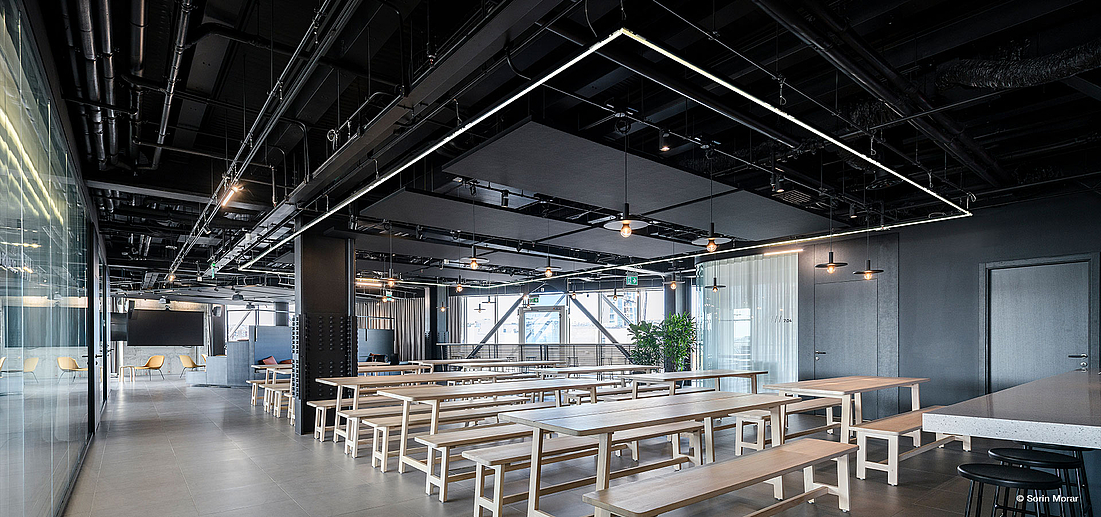 Office lighting with slim black luminaires by Luxsystem