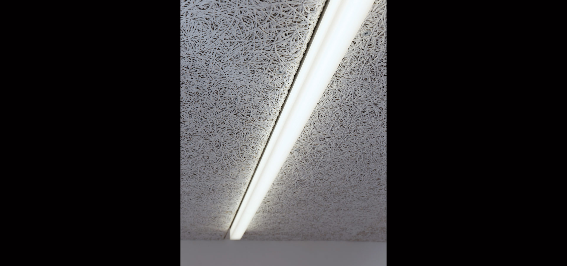 Luxsystem led luminaire light lines community hall huchenfeld
